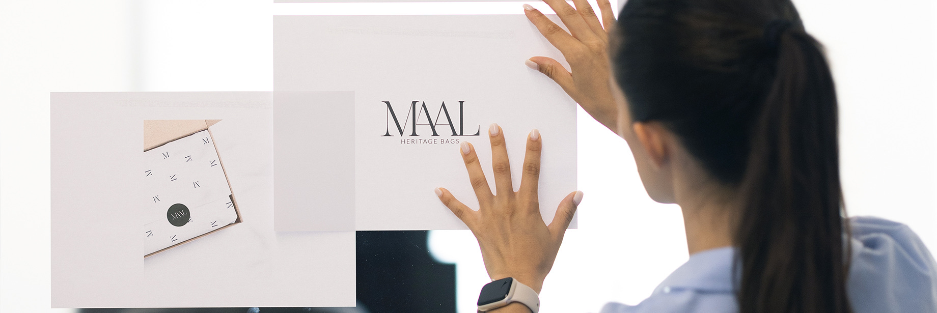Apresentação da identidade MAAL em parede